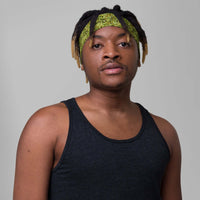 Custom cannabis print headband worn by a model, showcasing personalized fashion style for workouts or casual wear.