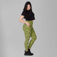Custom printed Bud Camo women's leggings with pockets, stylish high-waisted fit in vibrant cannabis-inspired design.