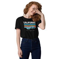 Custom printed California Waves organic cotton t-shirt featuring vibrant typography and wave patterns, perfect for surf culture.